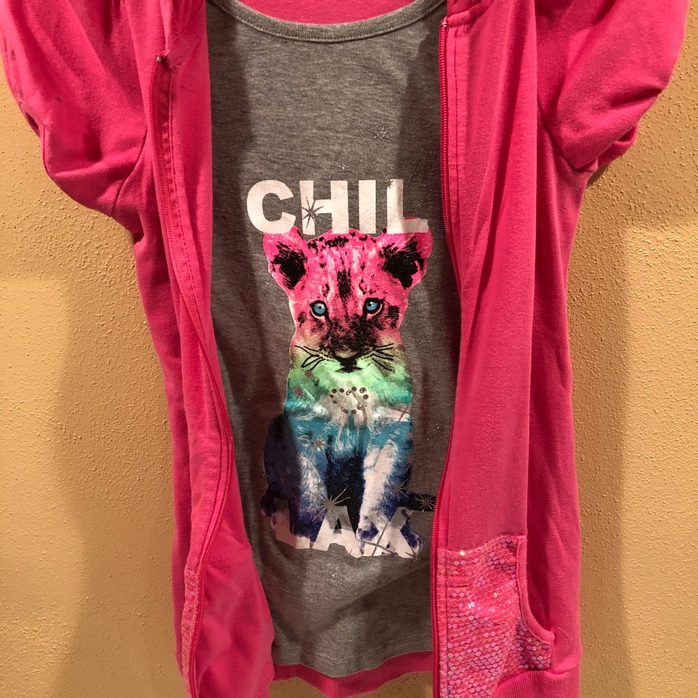 Girls short sleeved hoodie with attached T-shirt.